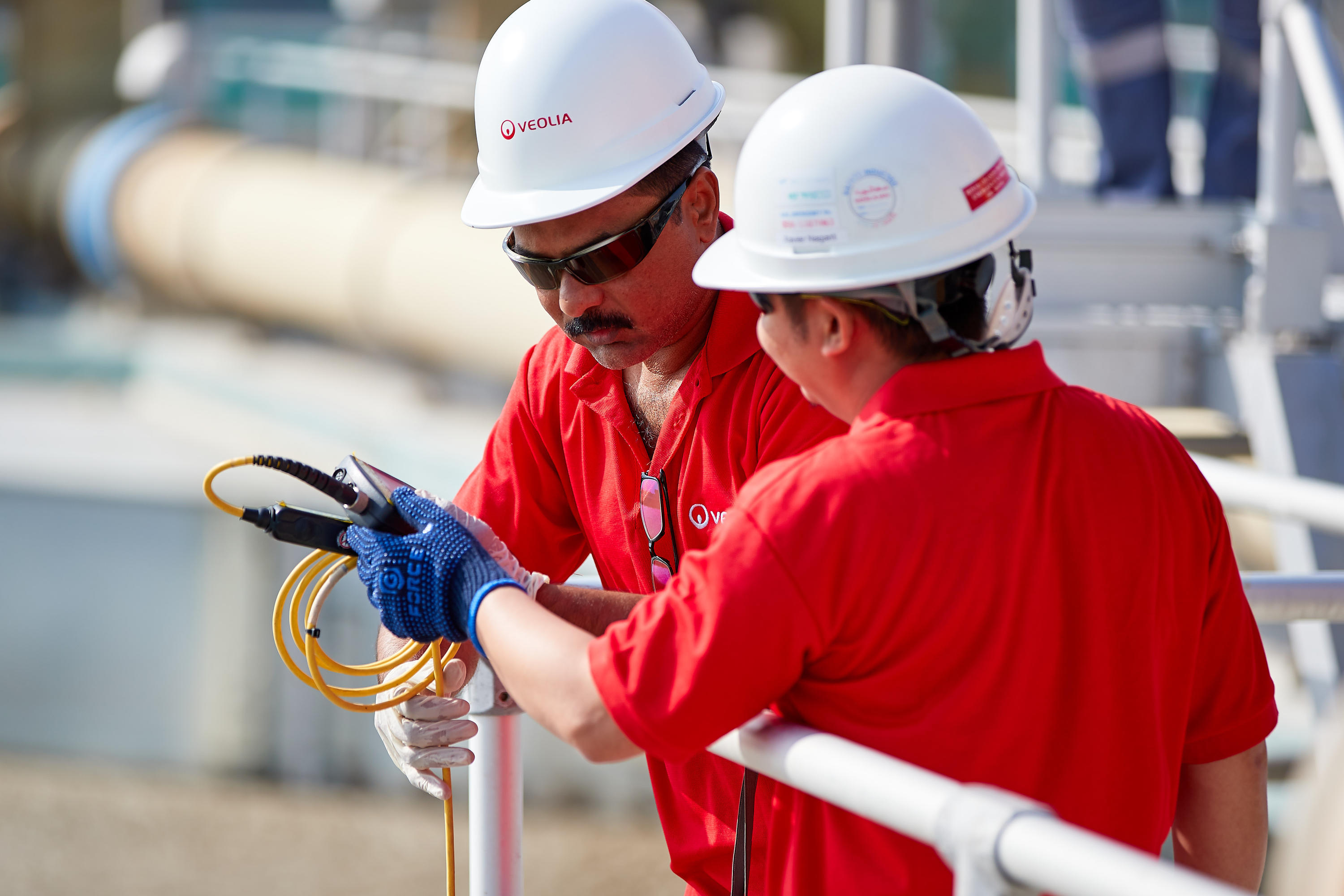 service image - men working with each other